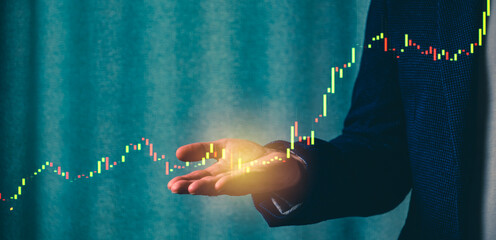 a successful investor, trader, manipulates the direction of the price of stocks, securities, the concept of investment and management, a close-up of the trader's hands