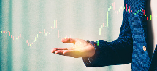 a successful investor, trader, manipulates the direction of the price of stocks, securities, the concept of investment and management, a close-up of the trader's hands
