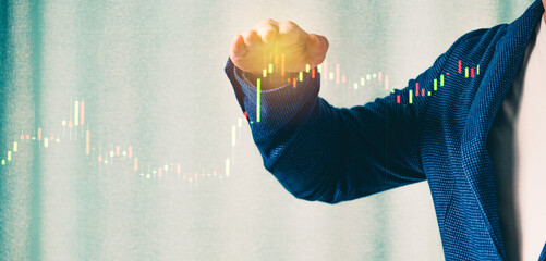 a successful investor, trader, manipulates the direction of the price of stocks, securities, the concept of investment and management, a close-up of the trader's hands
