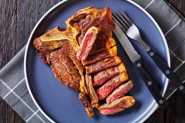 fried sliced porterhouse steak on a plate