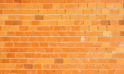 Orange brick wall splashed