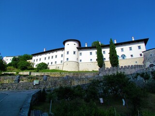 Fototapeta na wymiar Castle in small town of Stanjel in Littoral region of Slovenia lit bya sunlight