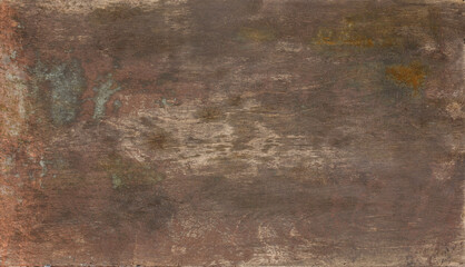 Wooden background painted with brown and bronze paint with green patina
