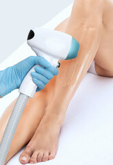 Elos epilation hair removal procedure on a woman’s body. Beautician doing laser rejuvenation in a beauty salon. Removing unwanted body hair. Hardware ipl cosmetology