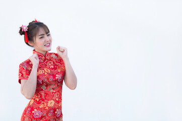 Portrait beautiful asian woman in Cheongsam dress on white background,Thailand people,Happy Chinese new year concept,Happy  asian lady in chinese traditional dress