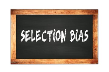 SELECTION  BIAS text written on wooden frame school blackboard.