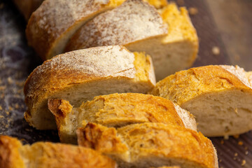 A closeup of sliced crusty French bread.