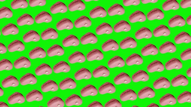 French macaroon cookies with raspberry and strawberry  pattern animated on a isolated background. advertising concept /High quality 4k sweets footage. Minimal motion design graphics art. The Concept o