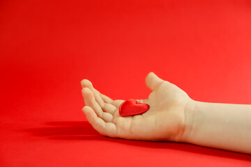 hand holding heart, hand with heart, happy valentine's day