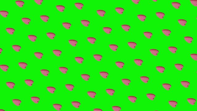 Valentine's Day themed A pink candy in the shape of a heart symbol  pattern animated on a isolated background. advertising concept /High quality 4k sweets footage. Minimal motion design graphics art. 