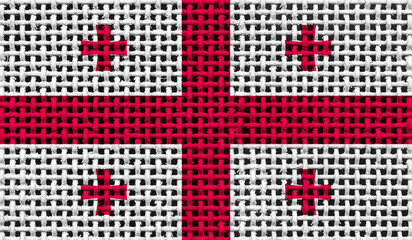 Georgia flag on the surface of a metal lattice. 3D image
