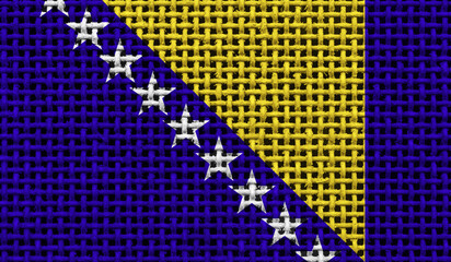 Bosnia and Herzegovina flag on the surface of a metal lattice. 3D image