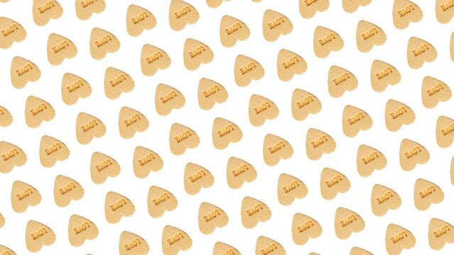 Motion graphics pattern with many yellow Hearts Candy for Valentines Day that wiggle/circular rotation on a white color background. 3 in 1 different sides and size animations for 10 sec. Love template