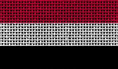 Yemen flag on the surface of a metal lattice. 3D image