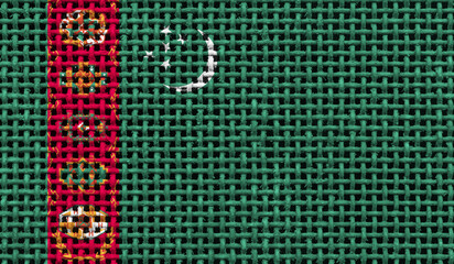 Turkmenistan flag on the surface of a metal lattice. 3D image