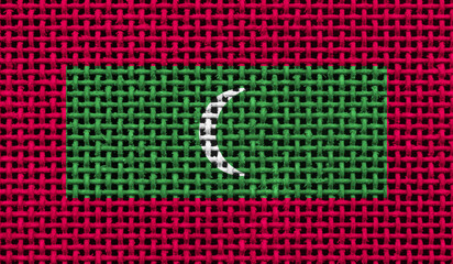 Maldives flag on the surface of a metal lattice. 3D image