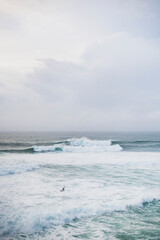 Stormy ocean waves during dusky sunset in coastal Oregon