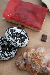Food is on the table. Sweets and bread products