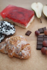 Food is on the table. Sweets and bread products