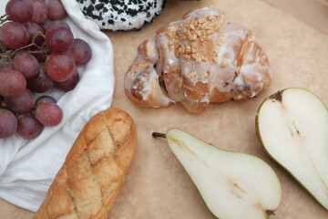 Food is on the table. Sweets and bread products