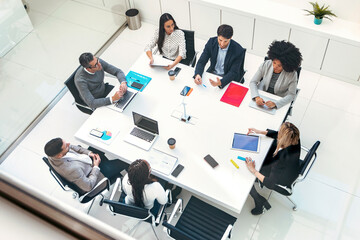 Business people discussing together in conference room during meeting at office in a modern startup.