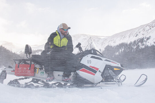 Fishing through the snow storm