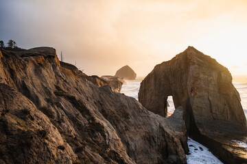 Eroding shoreline at sunset in coastal Oregon