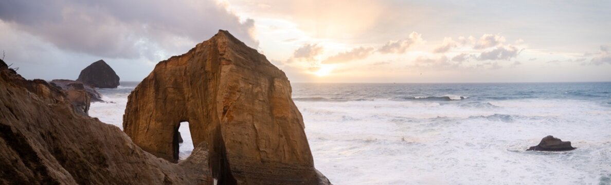 Pano stormy ocean waves during dusky sunset in coastal Oregon