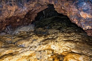 Stalactite, stalagmite walls of the cave. Template for design.