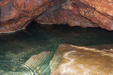 Stalactite, stalagmite walls of the cave. Template for design.