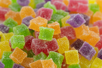 A lot of cube shape candy. Sugary chewing candy.