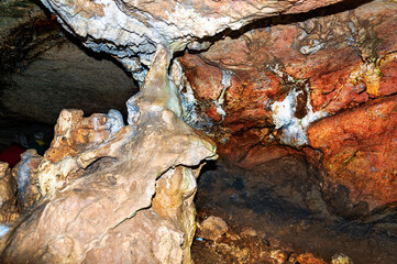 Obraz premium Stalactite, stalagmite walls of the cave. Template for design.