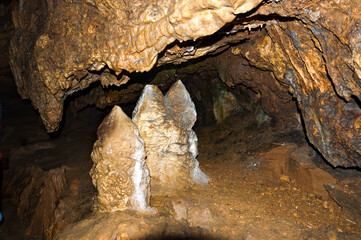 Stalactite, stalagmite walls of the cave. Template for design.