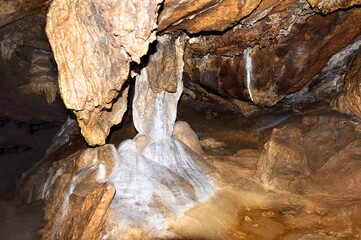Stalactite, stalagmite walls of the cave. Template for design.