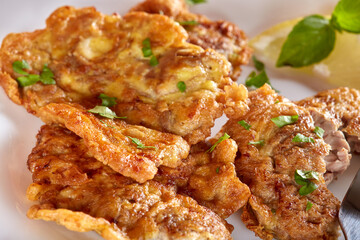 Fried pork brain meat.  - close up view