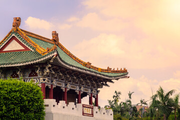 Fototapeta premium Sunset in the beautiful monument of east gate Taipei at day with clouds. Taiwan