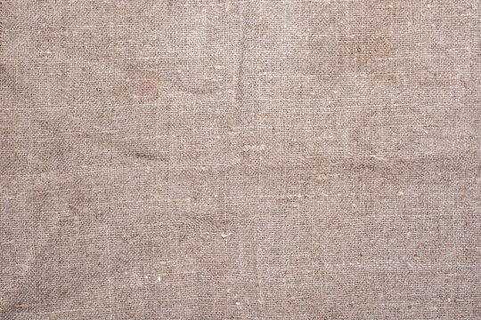 Abstract background of old linen fabric.
