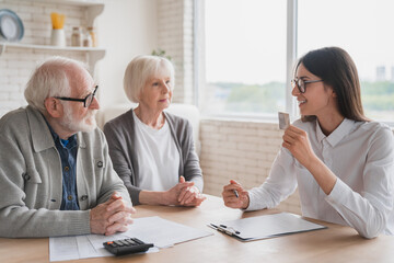 Bank employee insurance agent lawyer financial advisor broker discussing consulting senior elderly...