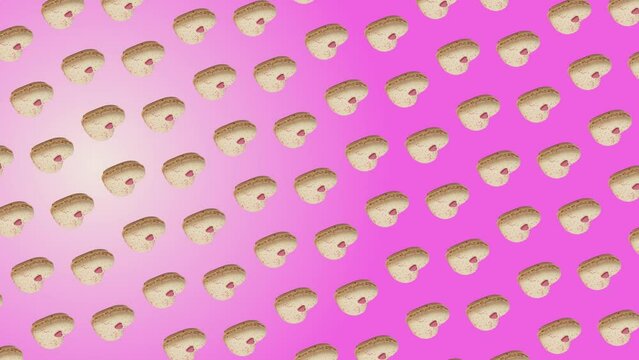 Colorful pattern of Valentine's Day themed Macaron or French macaroon in vanilla heart shapes isolated on trending natural pink color animation background .4K Creative animation video footage.