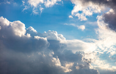 Cloud on blue sky background. White and grey color cloudscape, gloomy weather