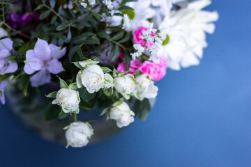 Bouquet of flowers on a blue background
