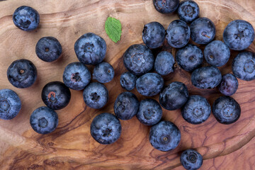 Juicy and fresh blueberries on a rustic table. Blueberry Antioxidant. Healthy and nutrition concept