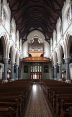 Fototapeta na wymiar interior of irish catholic church looking rearwards