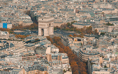 Paris buildings from city centre view from above on the top of Eiffel Tower during an amazing autumn day. Travel in France.