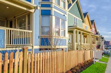 Houses in suburb with Spring Blossom in the north America. Luxury houses with nice white and pink coloured landscape.