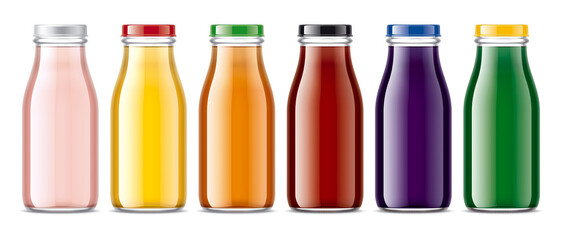 Set of Glass Bottles with transparent Juices. 