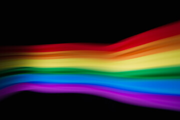 Colored blurred light lines. Abstraction of light. 
Lgbt flag.