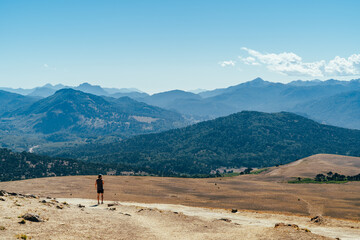 hiker and landscape in the mountains