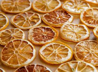 Dried oranges and lemons on a marble counter