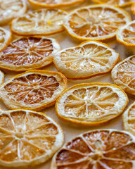 Dried oranges and lemons on a marble counter